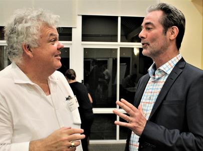IDC manager, Dr Stefan Sander, at right, chats to Australian deacon, Anthony Hill, of Adelaide, South Australia